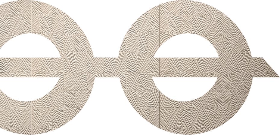 Logo Ground con texture geometrica incisa su superficie beige