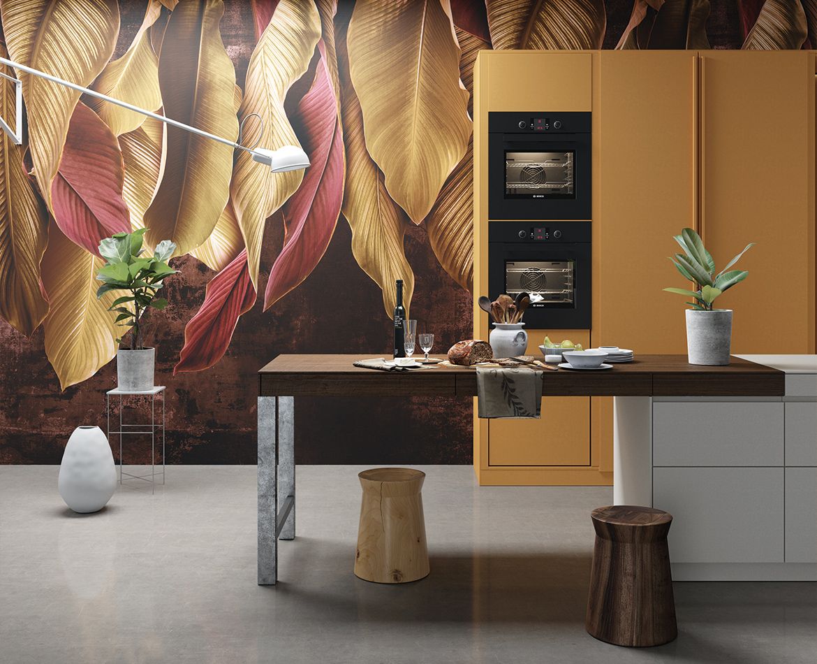 Parete decorativa con foglie oro e rosse