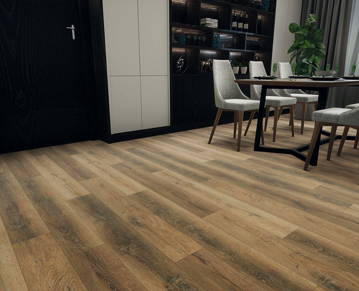 Pavimento in SPC con finitura naturale effetto rovere in una zona pranzo raffinata e contemporanea