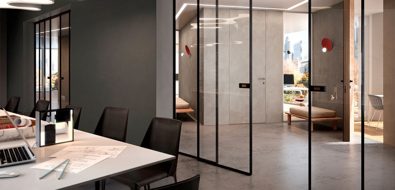 Porta in vetro con profili neri per ambienti interni contemporanei
